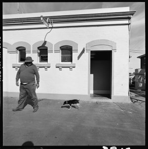 File 14: First visit, man with dog, [1988] / photograph...