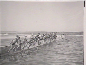 Aboriginal boys jumping in the water