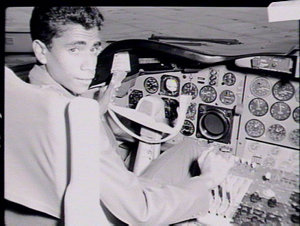 Aboriginal boy, Desmond Williams, in cockpit of Lockhee...