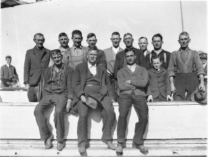 Group of thirteen workmen who built the tug-boat