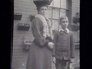 [Woman and boy dressed up]