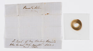 Item 11: Lock of George Ernest Morrison's hair, 1865