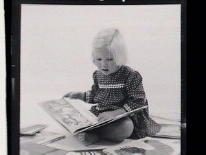 Shots for cover of publication: three-year-old reading ...