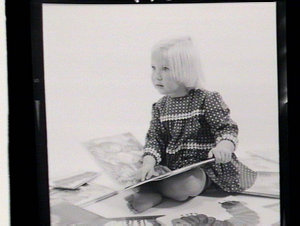 Shots for cover of publication: three-year-old reading ...