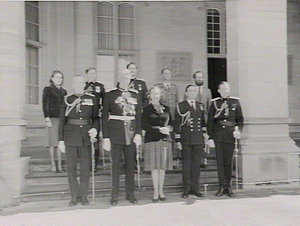 Governor Sir R. Cutler with staff