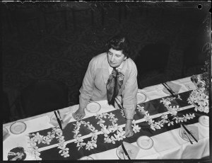 Decorating a table at Trocadero. Miss Cowan, 12 March 1...