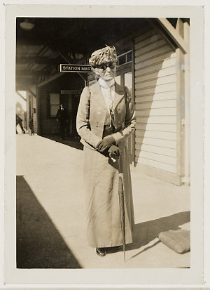 Daisy M. Bates, C.B.E., on a railway station platform, ...