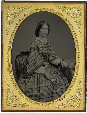 [Studio portrait of unknown woman, ca. 1858 / hand colo...