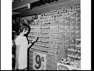 Display of Shelleys' Comic Cans of soft drink in a "han...