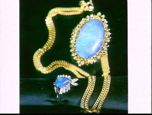 APA studio photograph of Diamond Traders' opal jeweller...