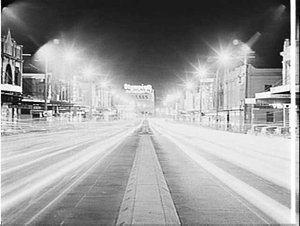 Night photographs of Sydney showing neon advertising si...