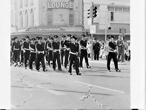 Governor-General Lord Casey reviews a march-past of tro...