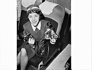 Airlines of NSW air hostess with respirator