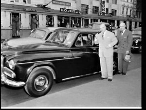 Pianist Jose Iturbi and chauffeur-driven Humber car, Sy...