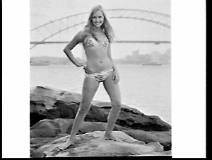 Janet Couttes in bikini poses at Mrs. Macquarie's Chair