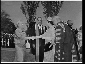 Elizabeth the Queen Mother unveils a plaque at the Rese...