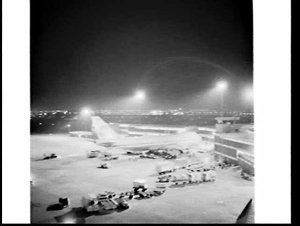 Pan Am 747 Jumbo jet lit at night, Kingsford-Smith Inte...