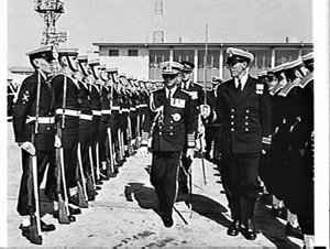 King Rama IX of Thailand inspects a Naval guard-of-hono...