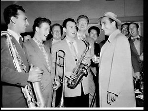 Swing band leader Artie Shaw arrives at Mascot