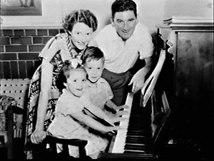 W.O. Band, Mrs. Band and their son and daughter at home...