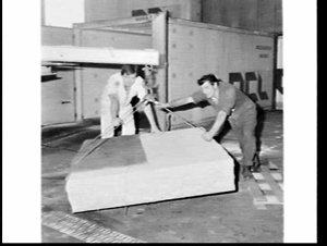 Loading a slab of granite for a memorial to Captain Coo...