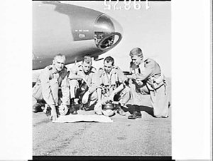 Crew of Canberra bomber check the flight plan, RAAF exe...