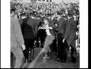Anti-apartheid demonstration with arrests and smoke bom...