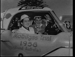 Women in a small car starting the 1958 Mobilgas Trial a...