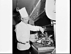 Dept. of Immigration photographs of migrants working at...