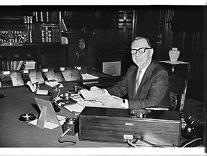 Premier Renshaw in his office