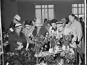 Women viewing roses at the Rose Society Show 1962, Farm...