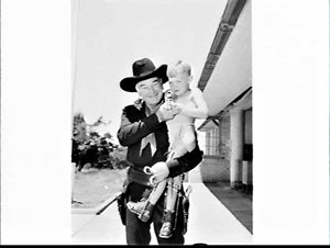 Hopalong Cassidy (William Boyd) visits the children at ...