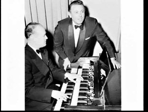 Alan Jones and organist Wilbur Kentwell on "Hour of Song" radio program at the 2UW Theatre