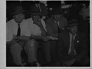 Graziers watching cattle judging at the 1958 Royal East...