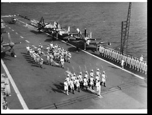 Band and guard drill on the flight deck of HMAS Sydney ...