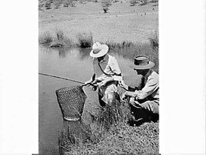 Ranger and fisherman discuss trout fishing laws, Lake E...