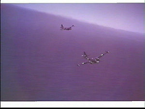RAAF Neptune reconnaissance aeroplane flying over sea o...