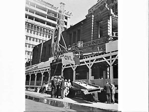 Crane collapses on demolition site, Old AMP Building (b...