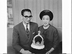 Cultured pearl producers Mr. and Mrs. Mikimoto with a p...