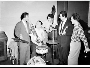 Gene Krupa at a party with musicians, Sydney