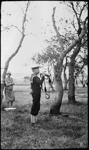 Blowing the bugle at Navy League camp, Long Reef