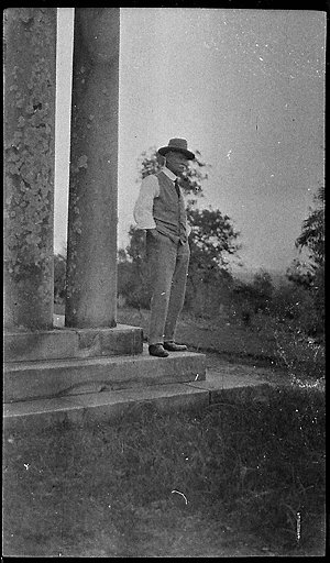 Man on the verandah of "Winbourne" (later destroyed by ...