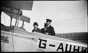 JJ Rouse and two officials inspecting the Avro Avian G-...