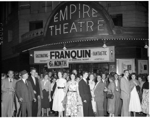 Audience of Franquin show outside Empire Theatre