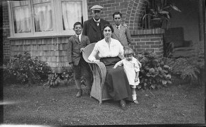 Unidentified family (man, woman, two boys and younger g...