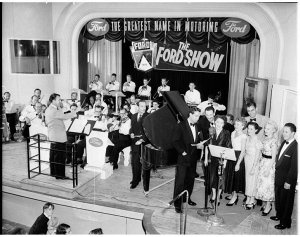 Singers and orchestra on the Ford Show stage at 2UW