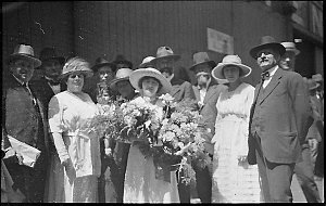 Unidentified woman celebrity presented with flowers