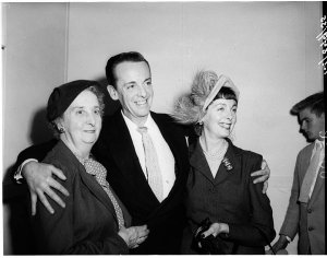 Robert Helpmann greets his mother and sister at Kingsfo...