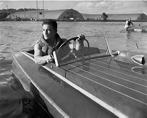 George Barnes driving a speed boat at Silverwater