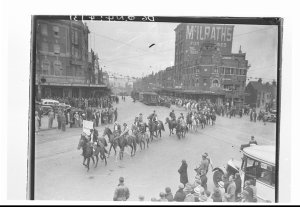 Procession of men and women pupils from the Walker Butl...